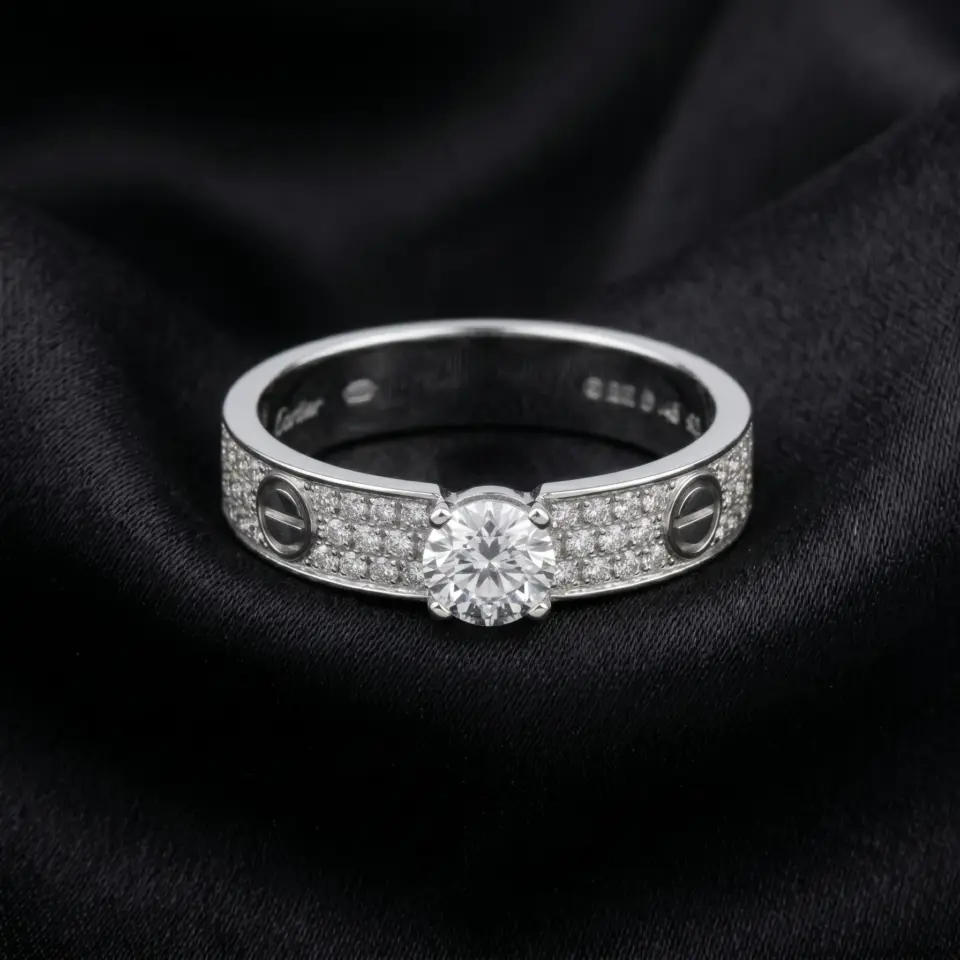 Cartier's, LOVE solitaire, brilliant-cut stone, paved