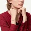 Change_bracelet_material_to_gold_202607041523_result-1.webp