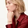 Change_bracelet_material_to_gold_202607041559_result-1.webp