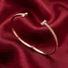 Change_bracelet_to_gold_red_202607151141_result-1.webp