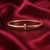 Change_bracelet_to_gold_red_202607151416_result-1.webp