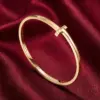 Change_bracelet_to_gold_red_202607151457_result-1.webp