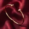 Change_bracelet_to_gold_red_202607151505_result-1.webp