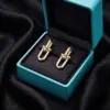 Change_earrings_to_18k_gold_202607041048_result-1.webp